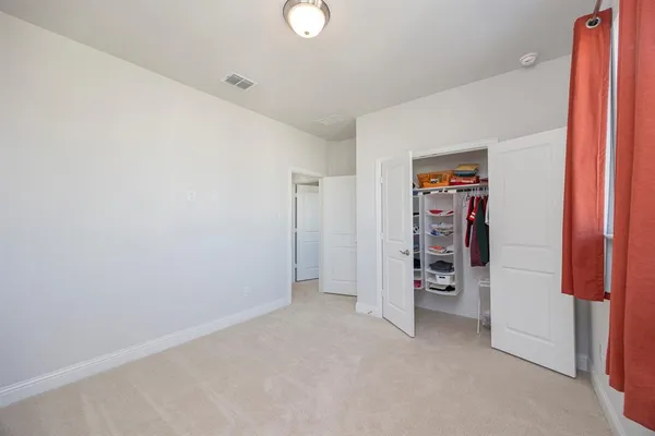 a view of room with a closet