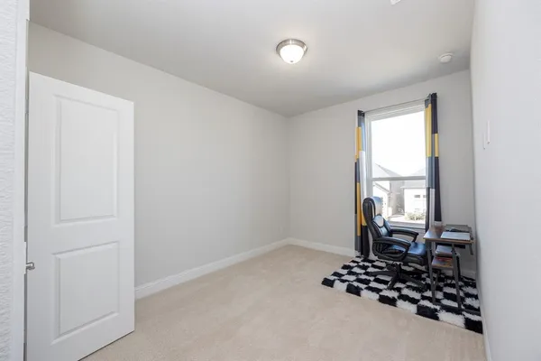 a view of a living room with a balcony