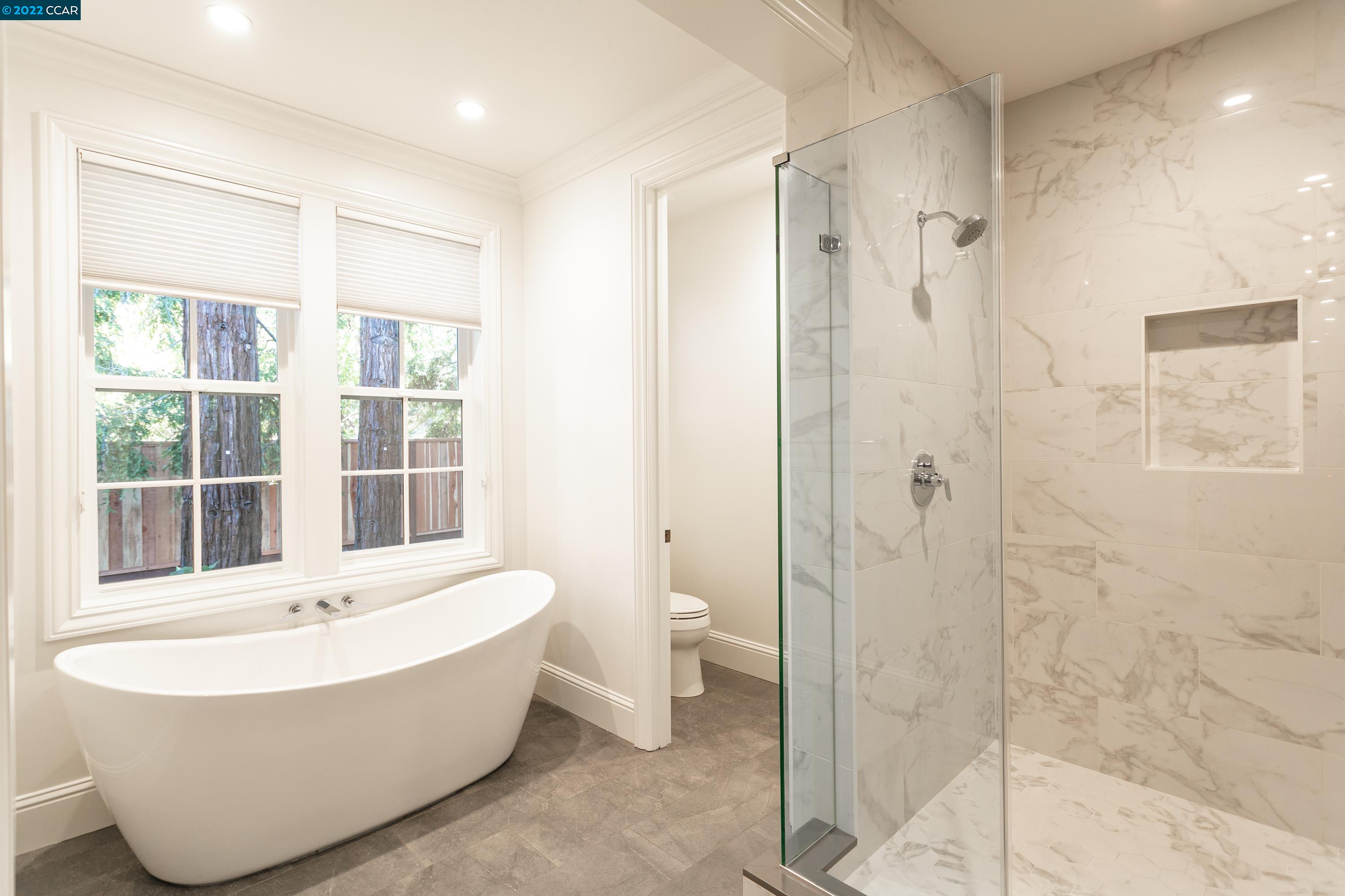 962 Reliez Station Lane Lafayette, CA 94549 - Photo 11 of 25 a bathroom with a bathtub and a shower