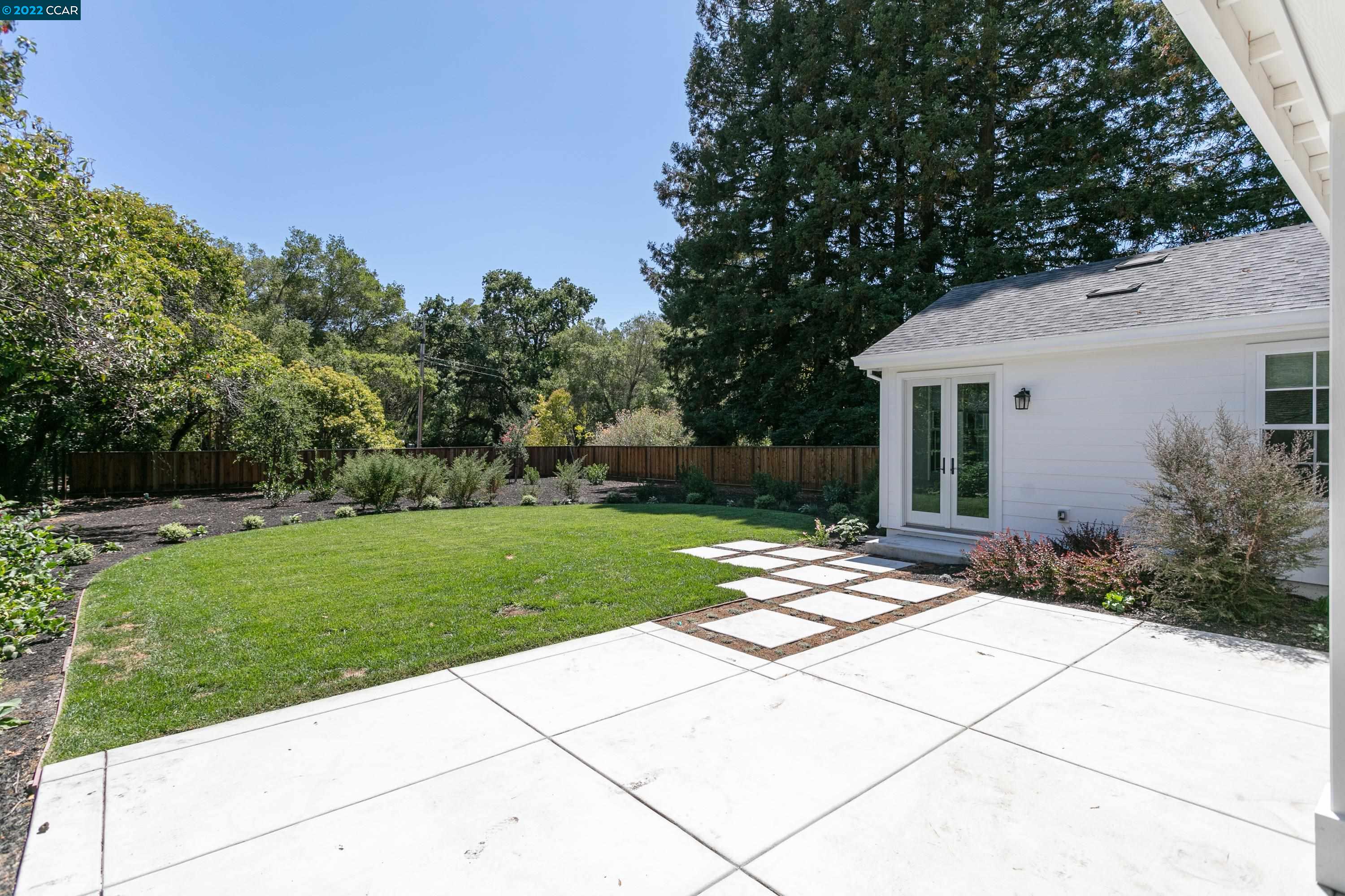 962 Reliez Station Lane Lafayette, CA 94549 - Photo 22 of 25 a backyard of a house with lots of green space