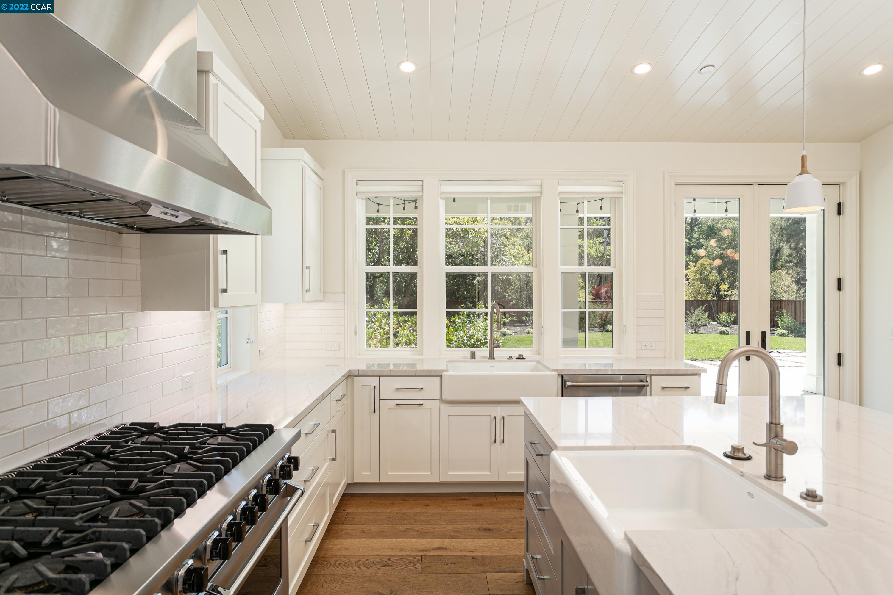 962 Reliez Station Lane Lafayette, CA 94549 - Photo 8 of 25 a kitchen that has a sink and a stove