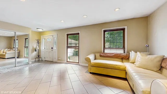 a large kitchen with stainless steel appliances granite countertop a stove and a sink