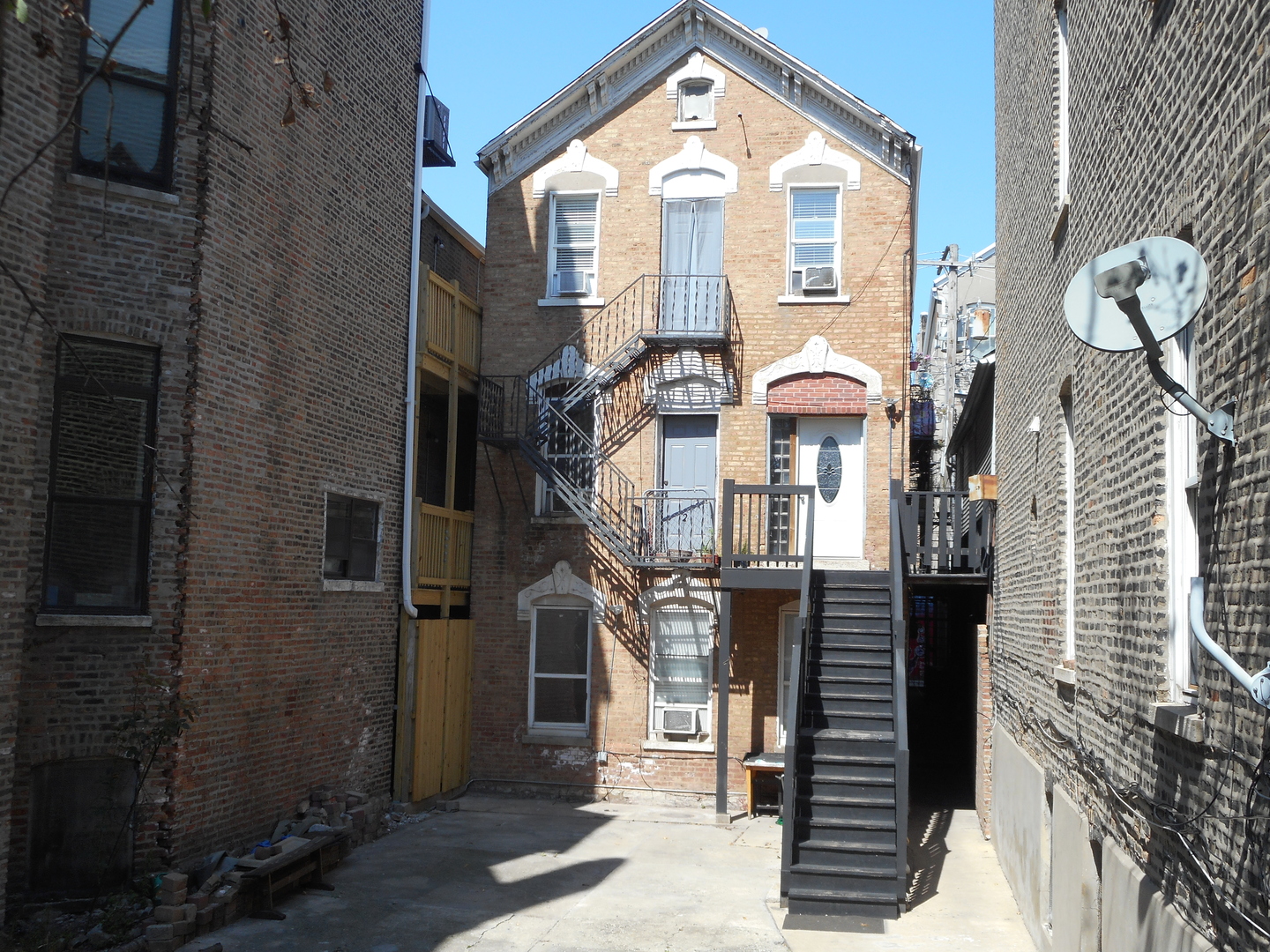 a front view of a house with large windows