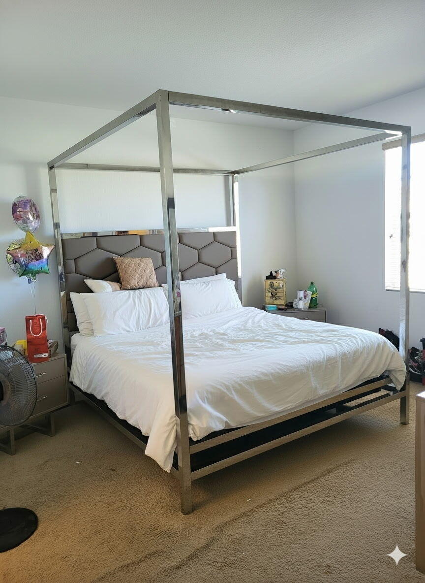 1021 Northwest 40th Terrace Lauderhill, FL 33313 - Photo 4 of 9 a bedroom with a bed and a window