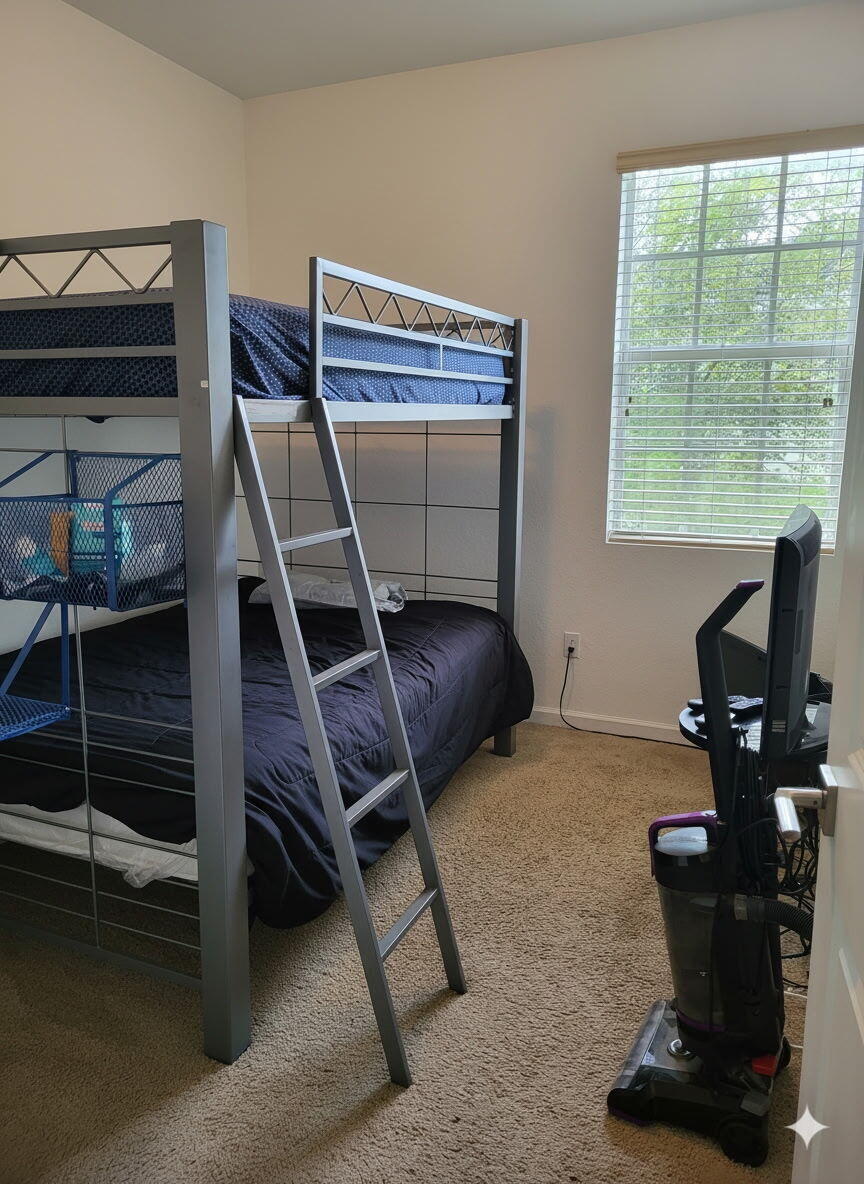 1021 Northwest 40th Terrace Lauderhill, FL 33313 - Photo 8 of 9 a room with gym equipment and a window