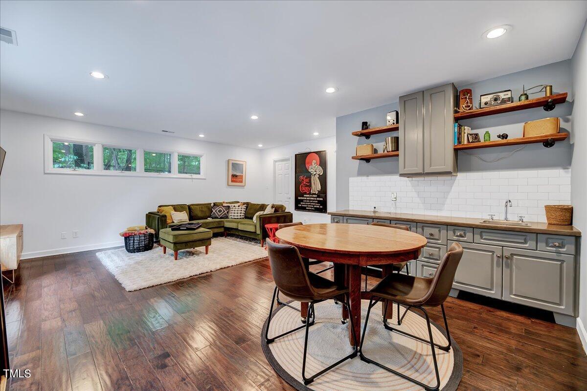 11313 Rumshill Road Raleigh, NC 27614 - Photo 20 of 55 a living room with furniture and wooden floor