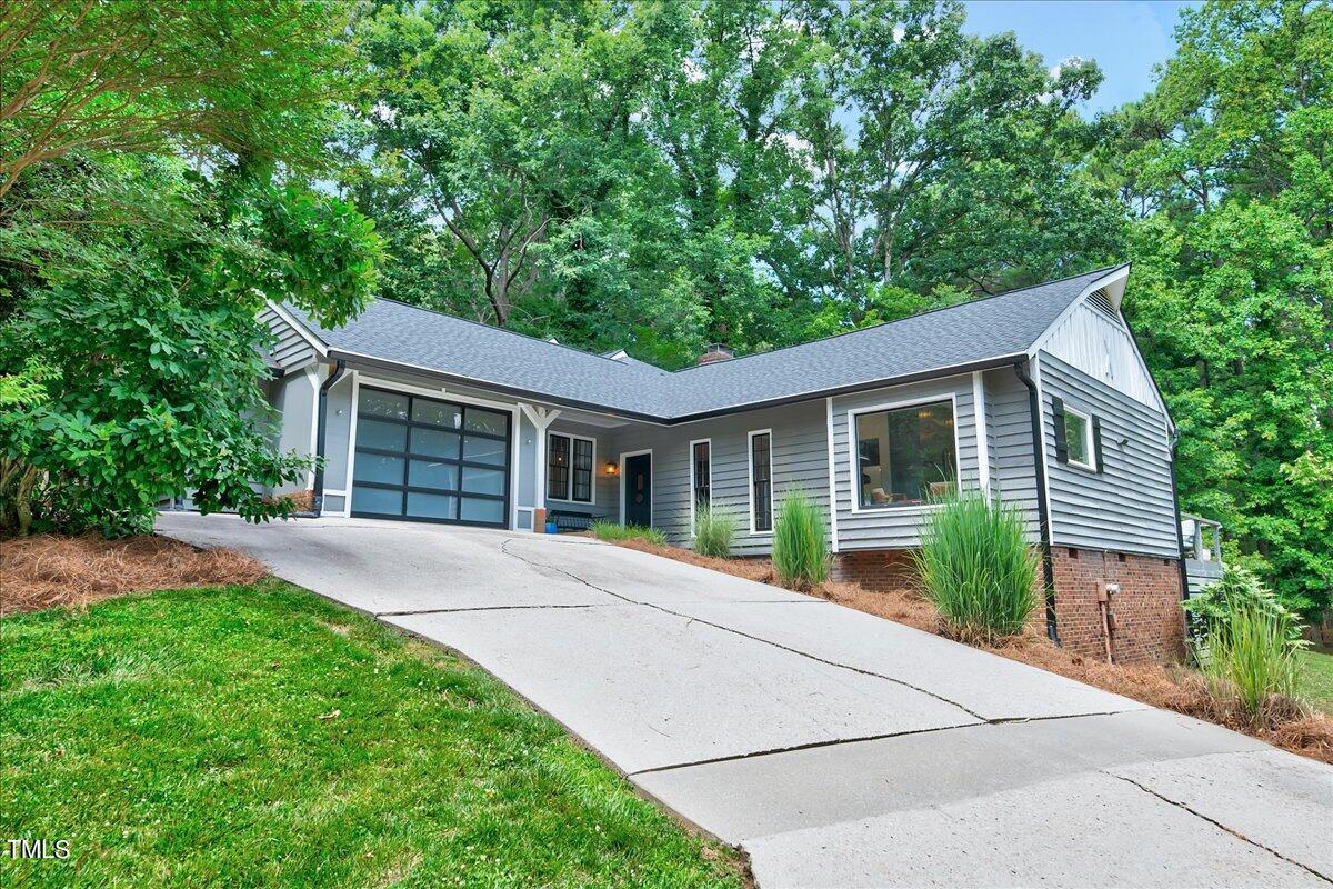 11313 Rumshill Road Raleigh, NC 27614 - Photo 2 of 55 a front view of a house with garden