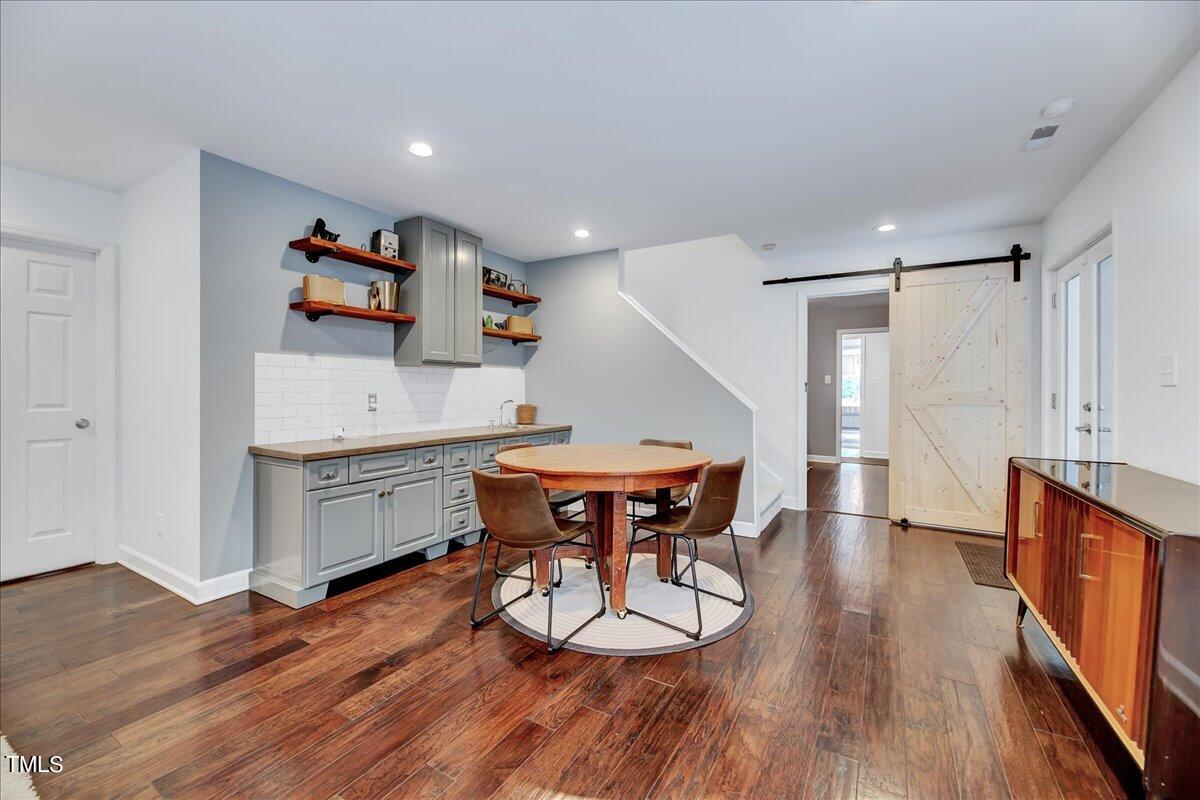 11313 Rumshill Road Raleigh, NC 27614 - Photo 21 of 55 a room with furniture and wooden floor