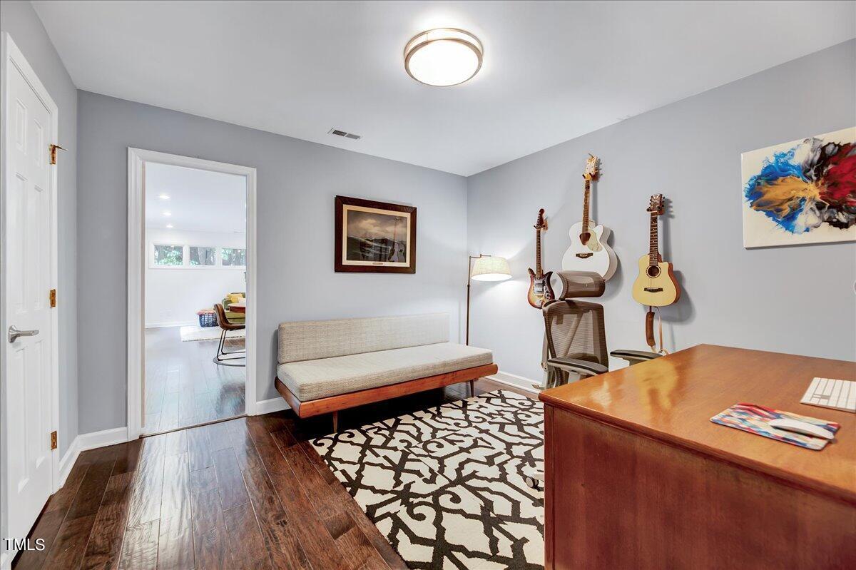 11313 Rumshill Road Raleigh, NC 27614 - Photo 25 of 55 a living room with furniture and a table
