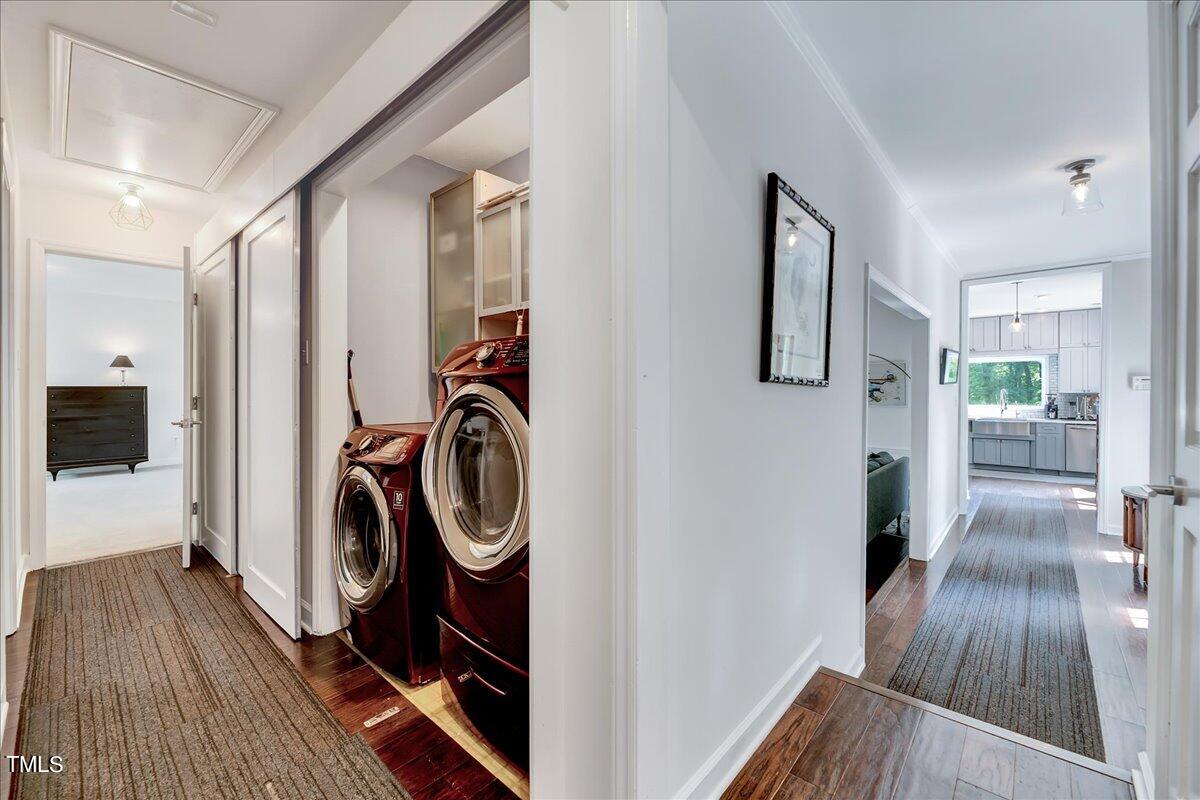 11313 Rumshill Road Raleigh, NC 27614 - Photo 30 of 55 a view of a hallway with wooden floor and furniture
