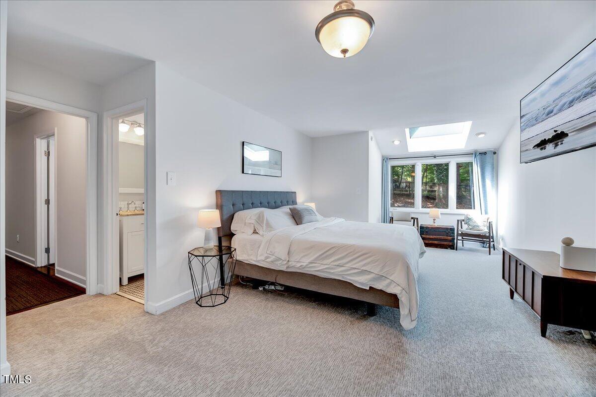 11313 Rumshill Road Raleigh, NC 27614 - Photo 33 of 55 a bedroom with bed and window