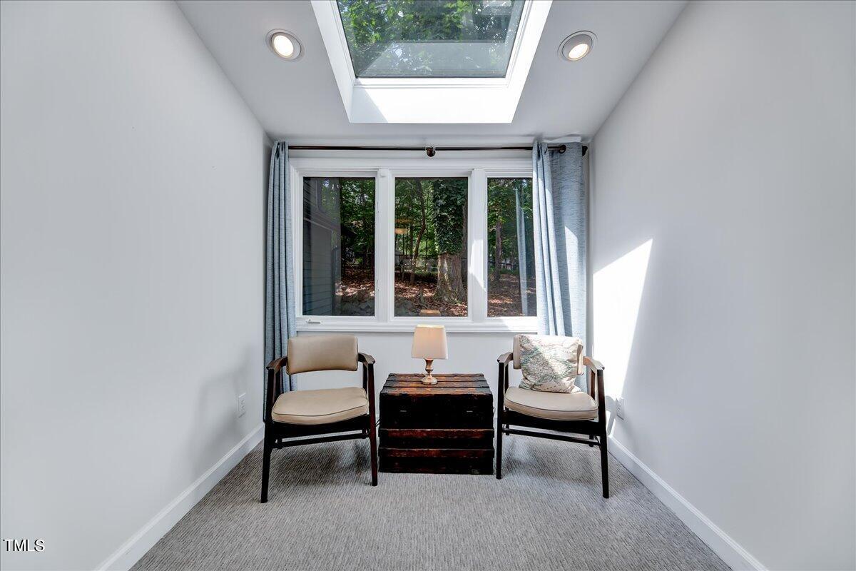 11313 Rumshill Road Raleigh, NC 27614 - Photo 34 of 55 a living room with furniture and a window