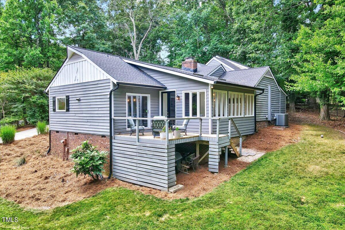 11313 Rumshill Road Raleigh, NC 27614 - Photo 48 of 55 a view of a house with a yard and deck area