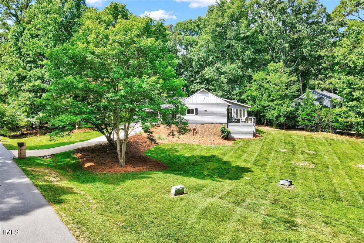 11313 Rumshill Road Raleigh, NC 27614 - Photo 50 of 55 a house view with a garden space