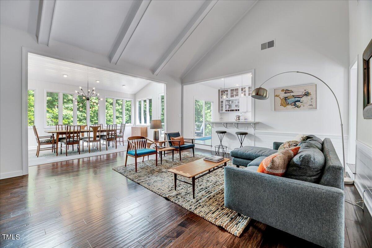 11313 Rumshill Road Raleigh, NC 27614 - Photo 6 of 55 a living room with furniture and a large window