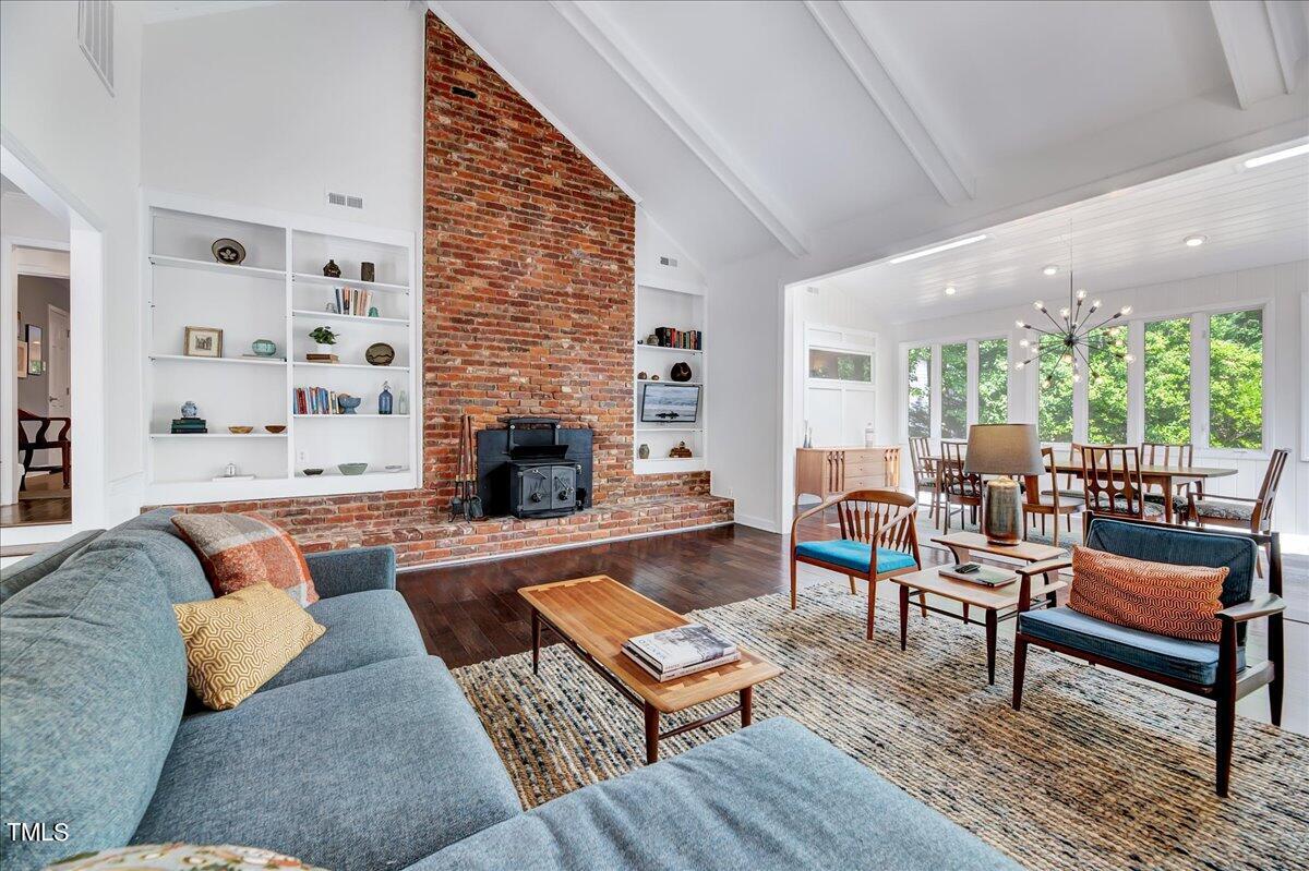 11313 Rumshill Road Raleigh, NC 27614 - Photo 10 of 55 a living room with furniture and a fireplace