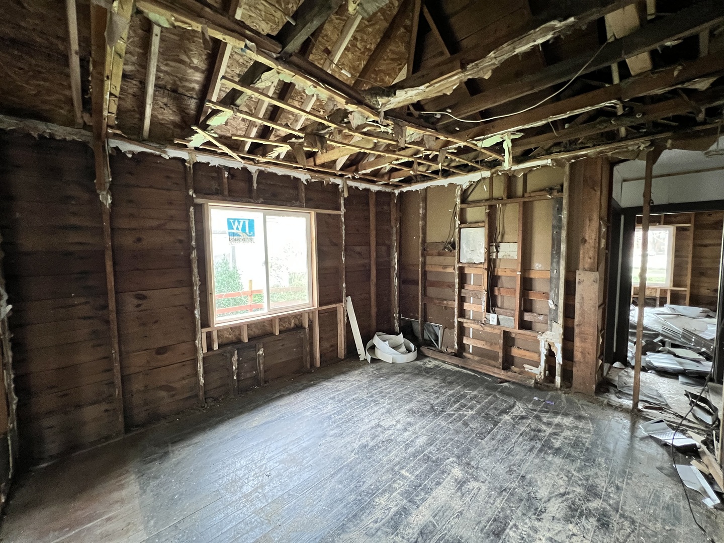 329 Albert Boulevard Kankakee, IL 60901 - Photo 6 of 15 a view of an empty room with wooden walls