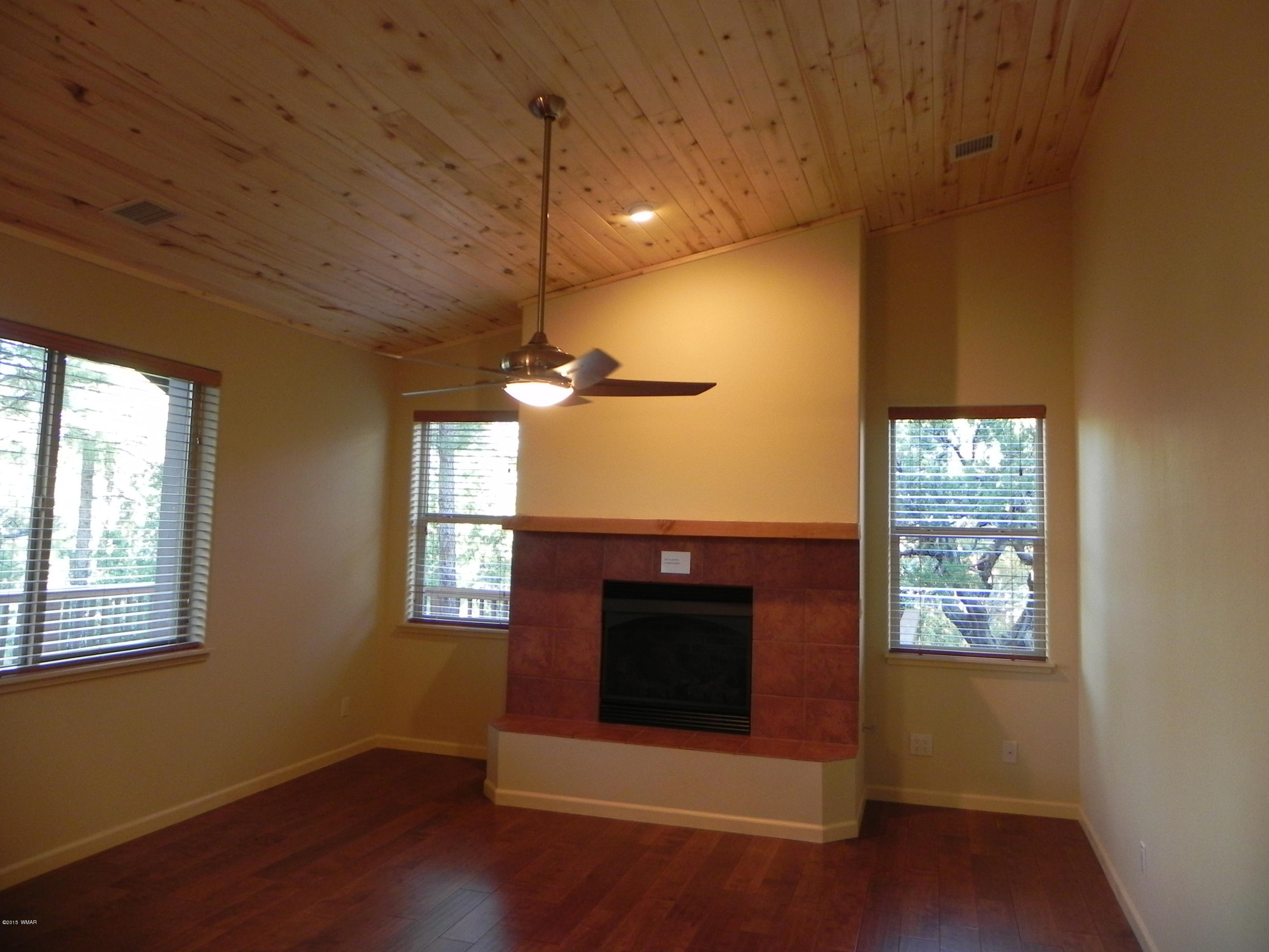 5975 Luminary Way Lakeside, AZ 85929 - Photo 12 of 44 a view of a livingroom with a fireplace