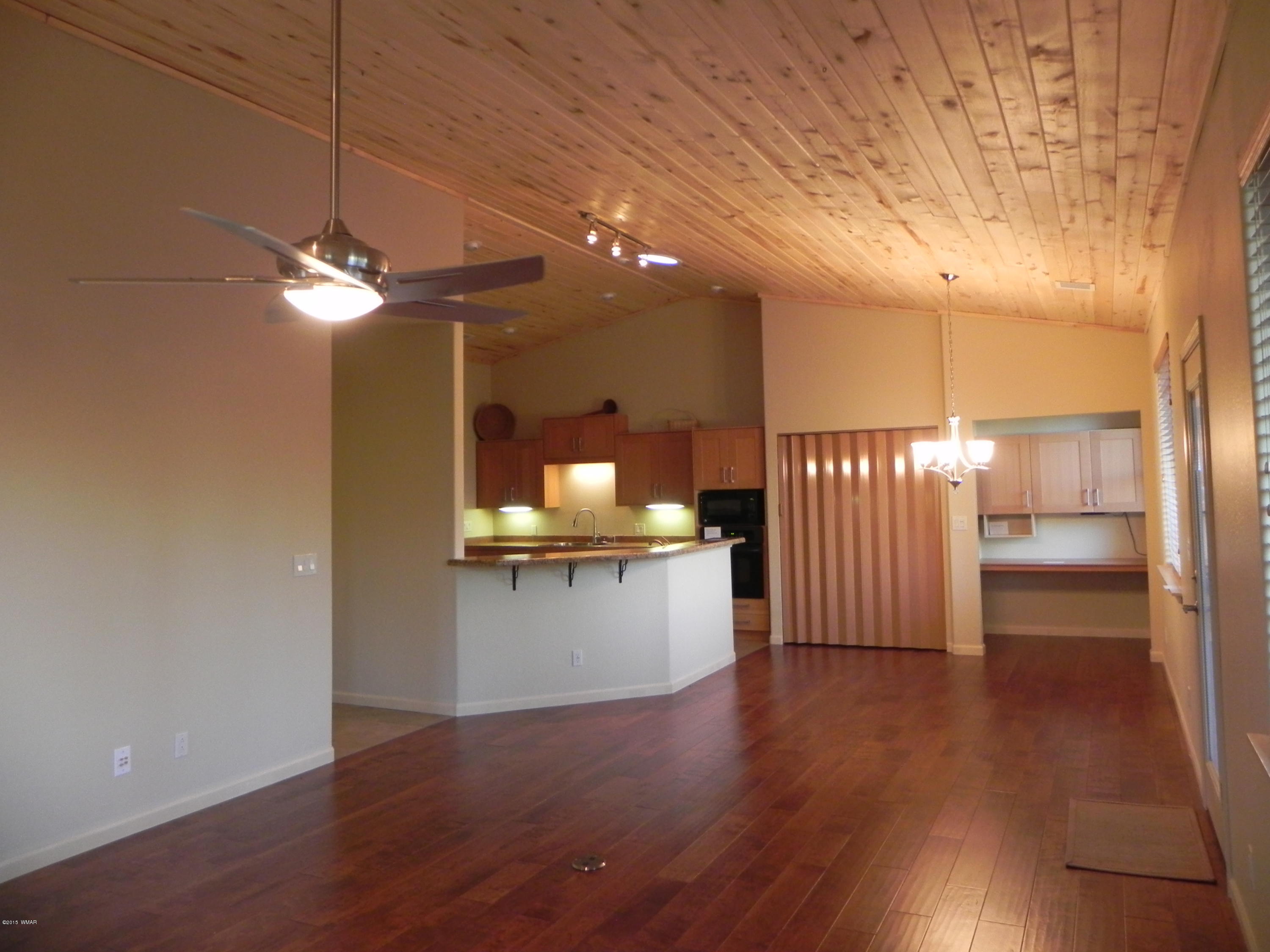5975 Luminary Way Lakeside, AZ 85929 - Photo 13 of 44 a view of entryway with wooden floor