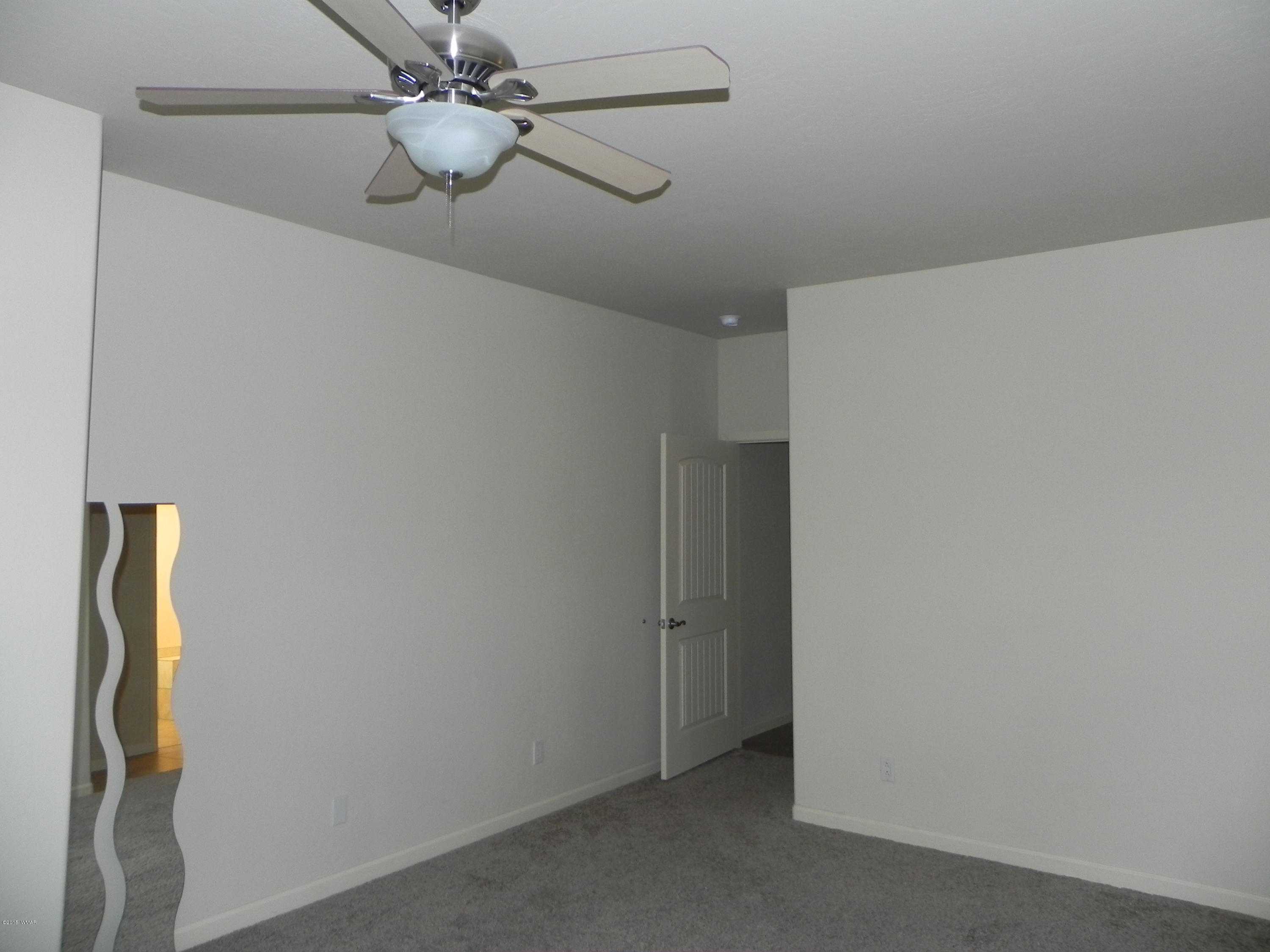 5975 Luminary Way Lakeside, AZ 85929 - Photo 33 of 44 a view of an empty room
