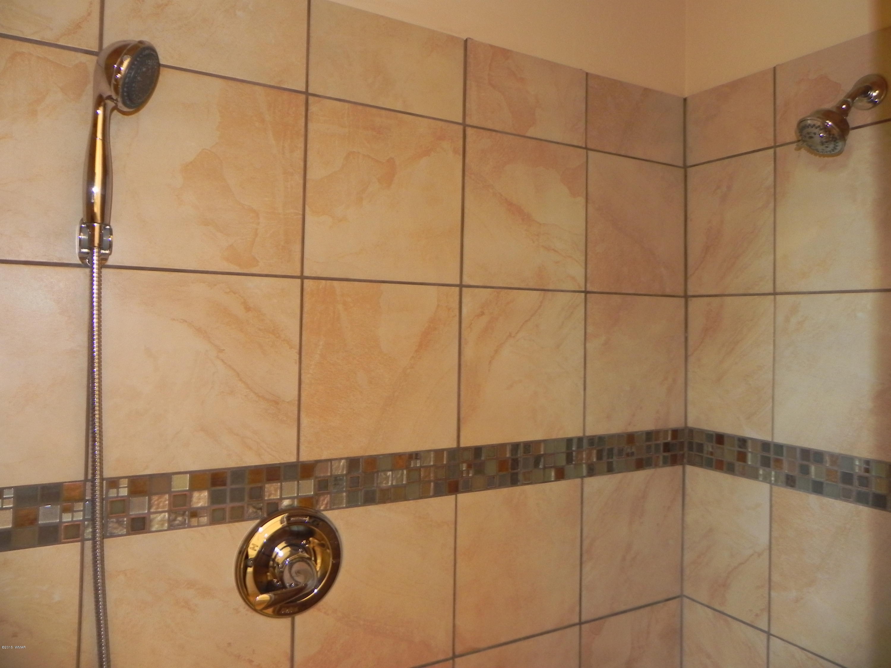 5975 Luminary Way Lakeside, AZ 85929 - Photo 35 of 44 a bathroom with a shower and a shower