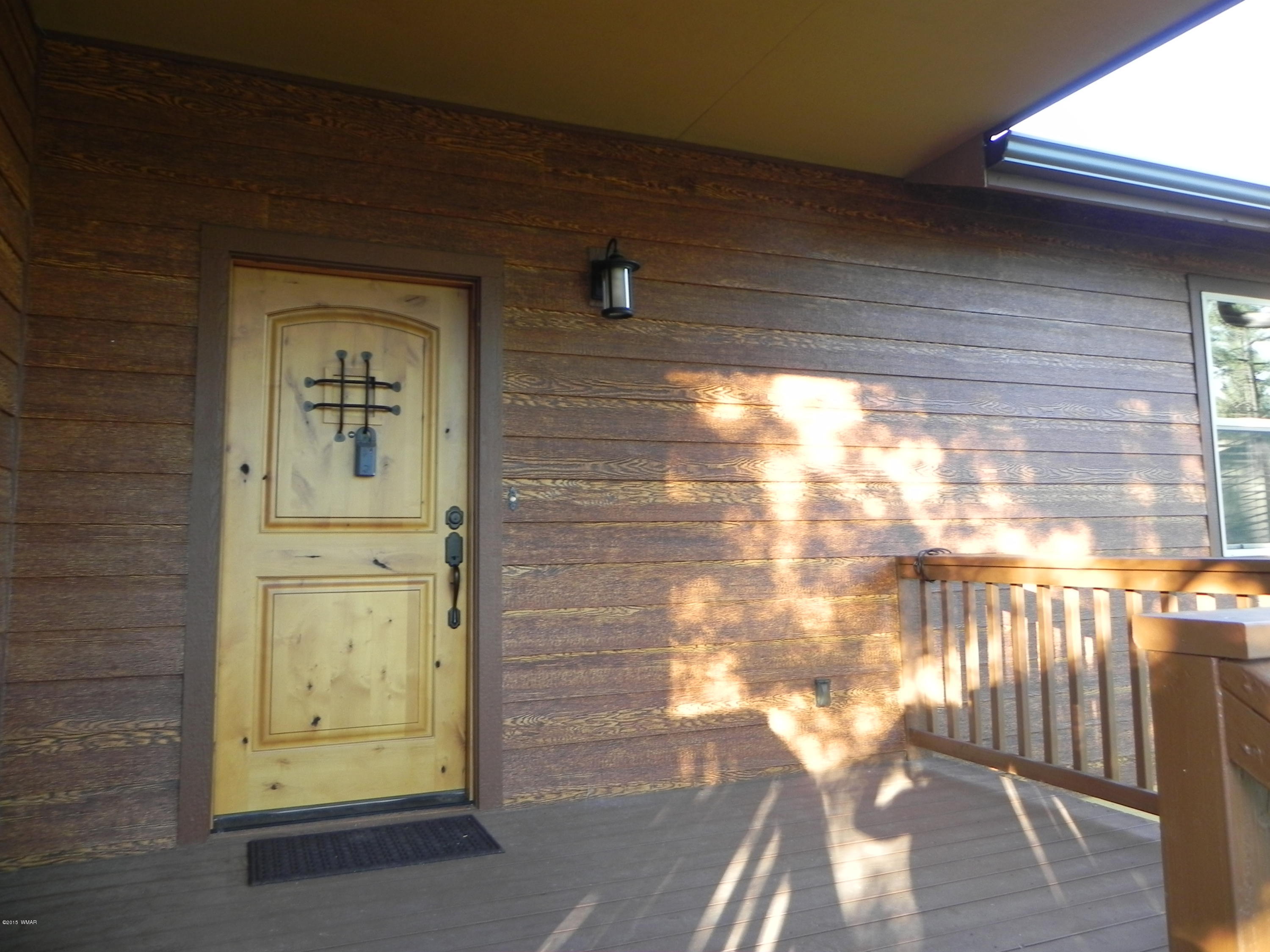 5975 Luminary Way Lakeside, AZ 85929 - Photo 9 of 44 a view of front door
