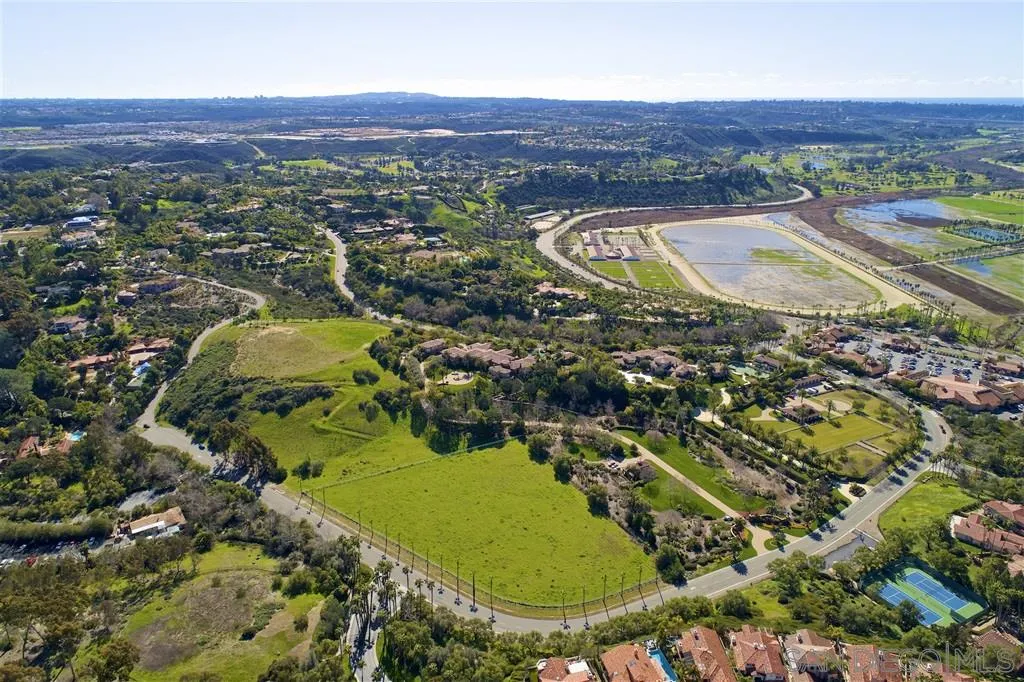 5872 Rancho Diegueno Road, Unit 15 Del Mar, CA 92014 - Photo 3 of 13 an aerial view of residential houses with outdoor space