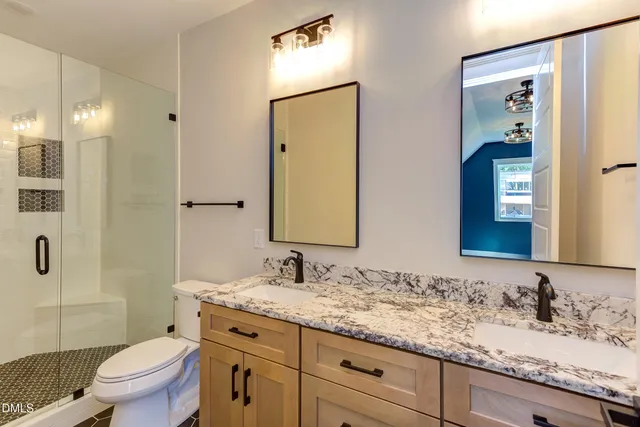 a view of a hallway with closet and front door