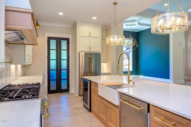 a bathroom with a sink a mirror and a shower