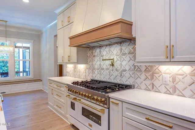 a kitchen with a stove and a microwave