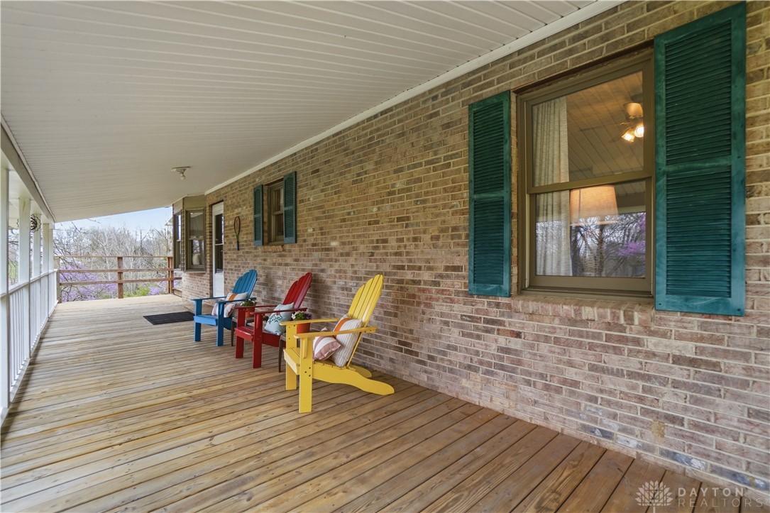 7553 Coffin Station Road Springfield, OH 45502 - Photo 86 of 95 This inviting porch, perfect for relaxation, offers a warm welcome to all who visit.