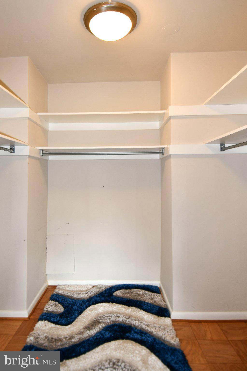 5101 River Road, Unit 712 Bethesda, MD 20816 - Photo 20 of 38 Spacious closet with modern design.