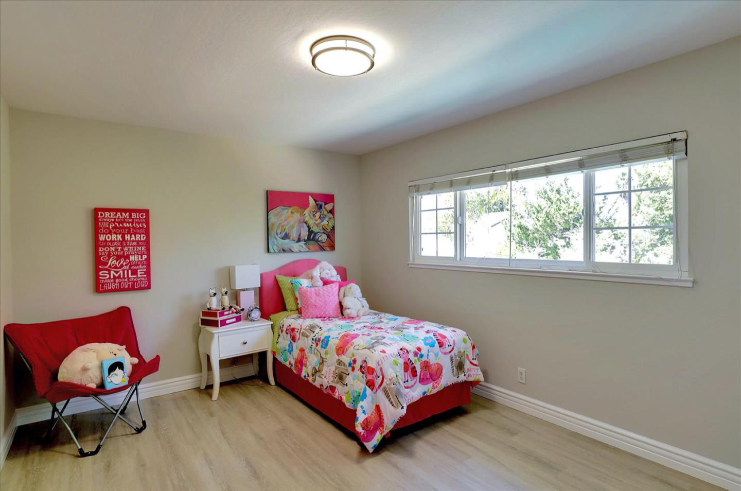 731 West 9th Street Gilroy, CA 95020 - Photo 26 of 37 a bedroom with a bed and a window