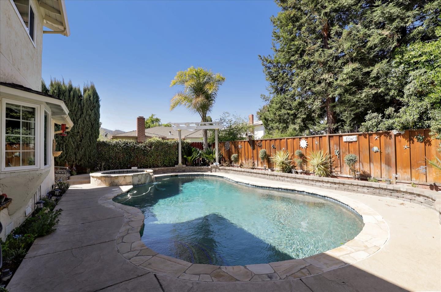 731 West 9th Street Gilroy, CA 95020 - Photo 32 of 37 a view of a swimming pool with a lounge chairs