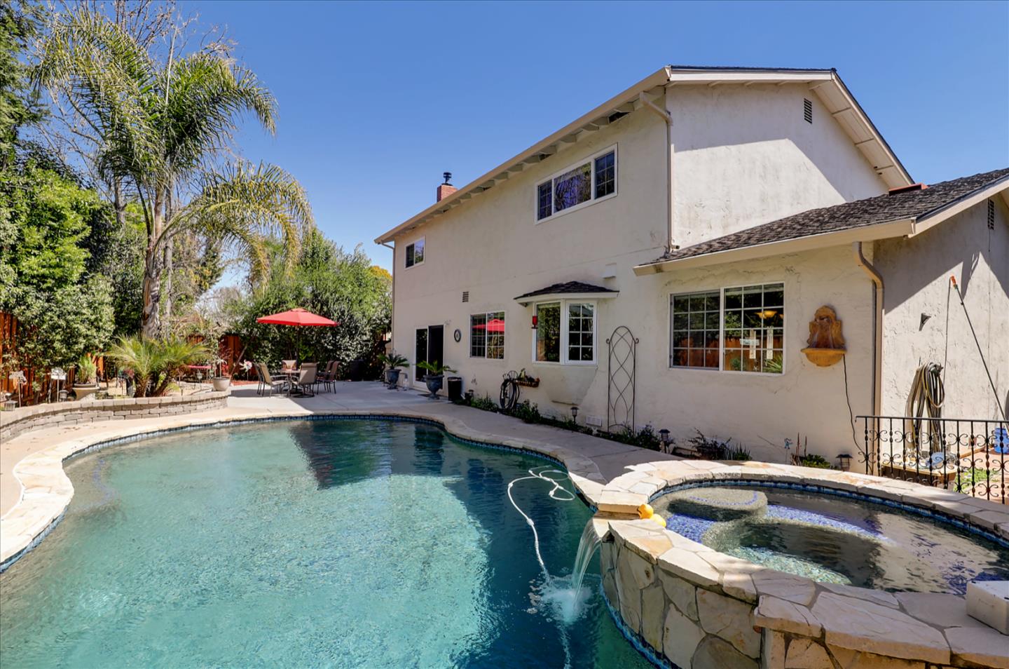 731 West 9th Street Gilroy, CA 95020 - Photo 33 of 37 a front view of house with swimming pool and porch