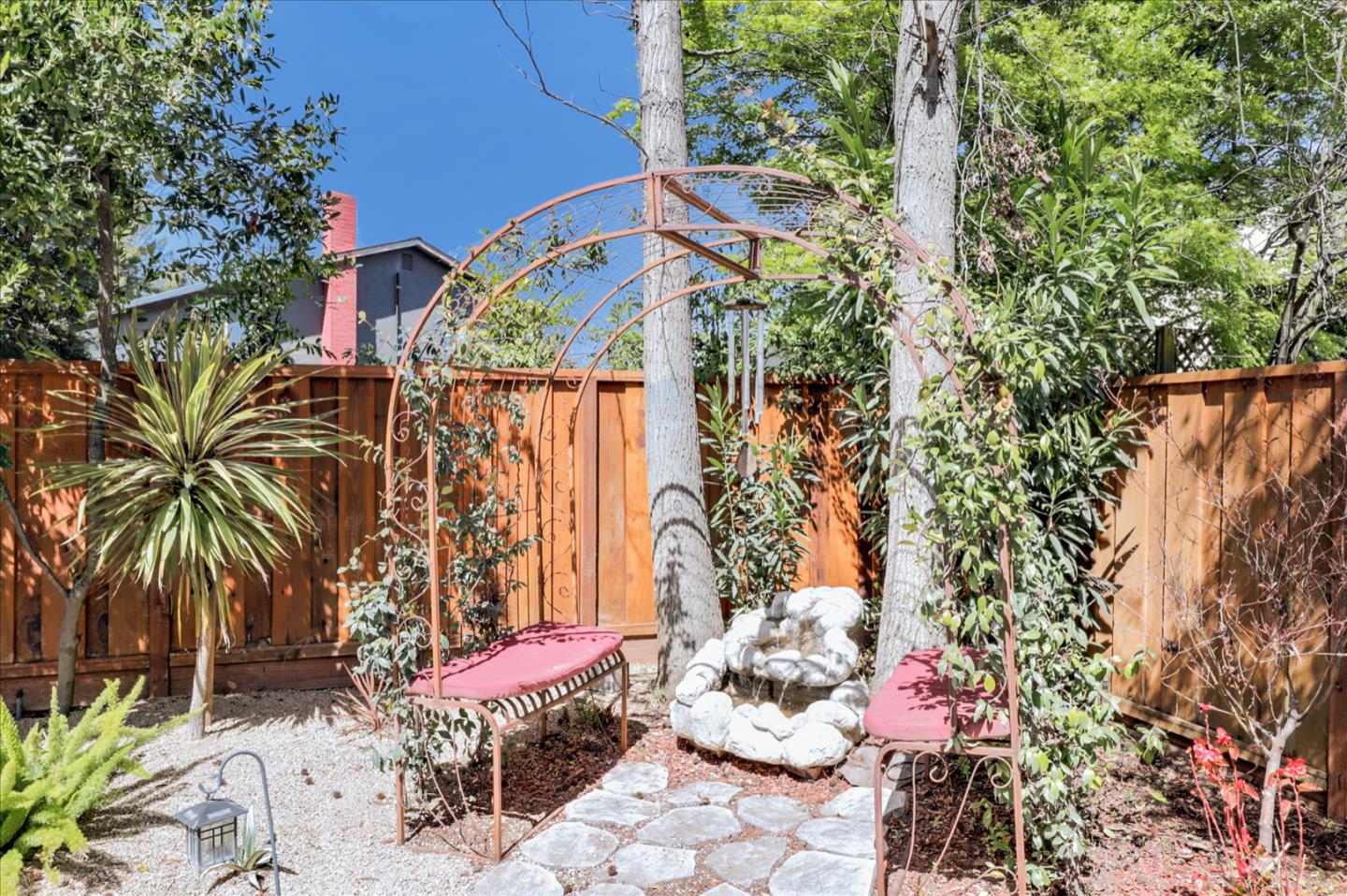 731 West 9th Street Gilroy, CA 95020 - Photo 34 of 37 a view of a chairs and table in a backyard
