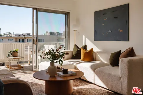 a view of a balcony with chairs