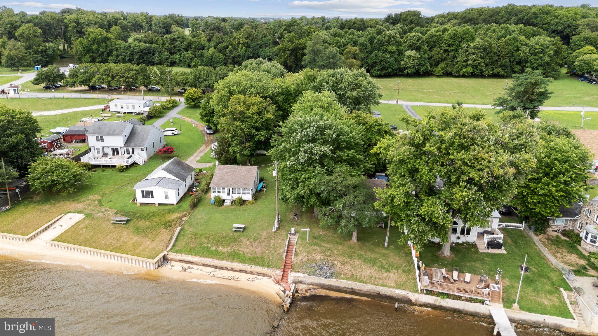 2115 Rocky Point Road Essex, MD 21221 - Photo 7 of 17 an aerial view of a house with a yard basket ball court and outdoor seating
