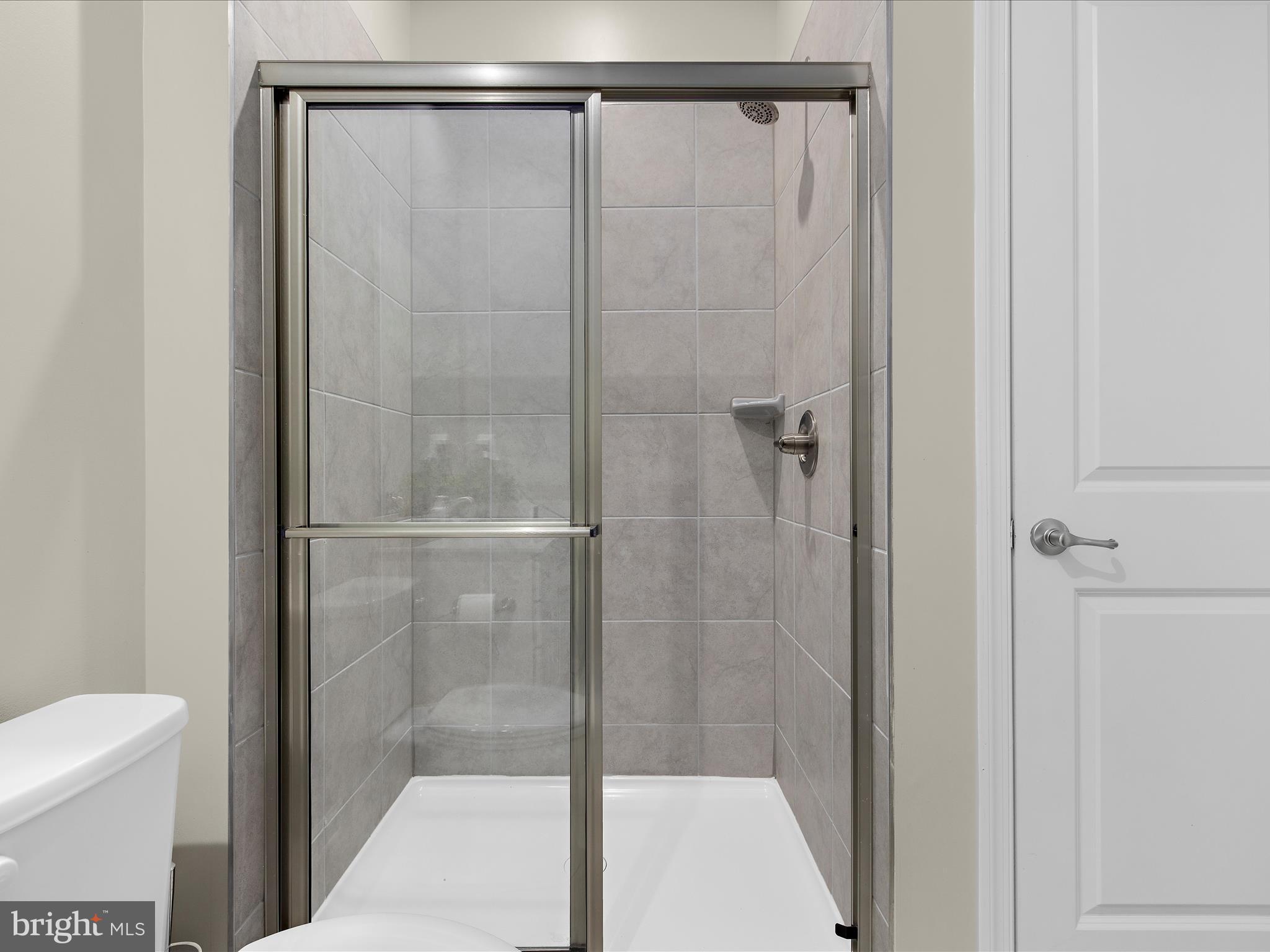 3100 Shaws Road Edgemere, MD 21219 - Photo 37 of 88 a bathroom with a shower and a toilet