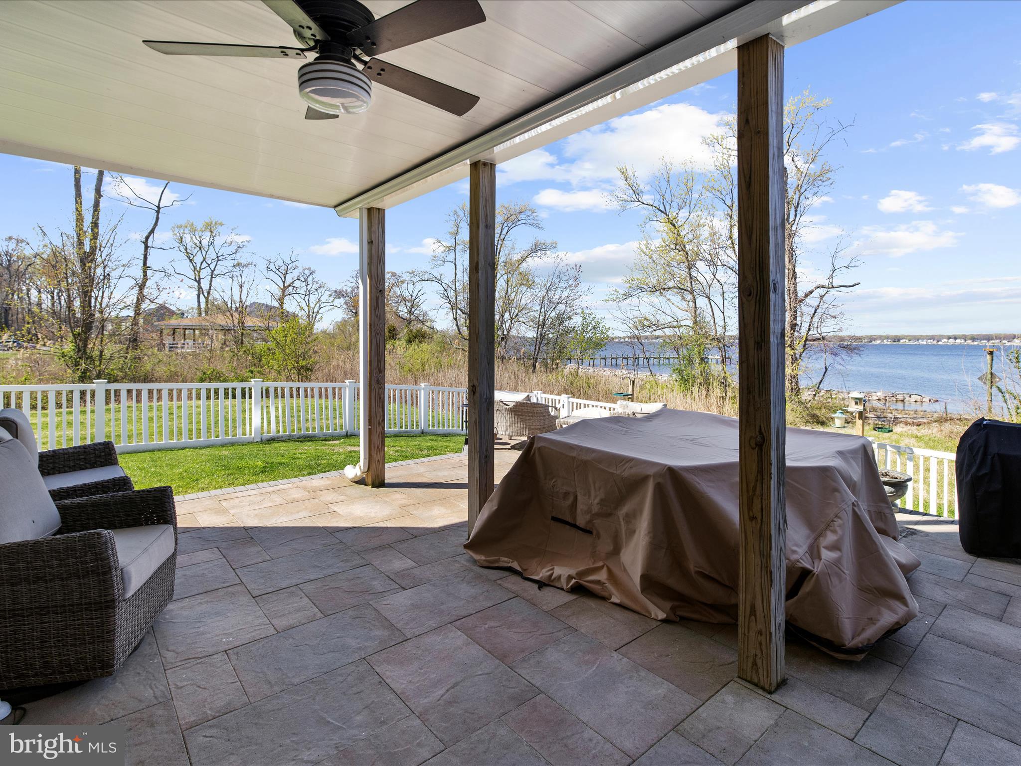 3100 Shaws Road Edgemere, MD 21219 - Photo 57 of 88 a living room with couch and a floor to ceiling window