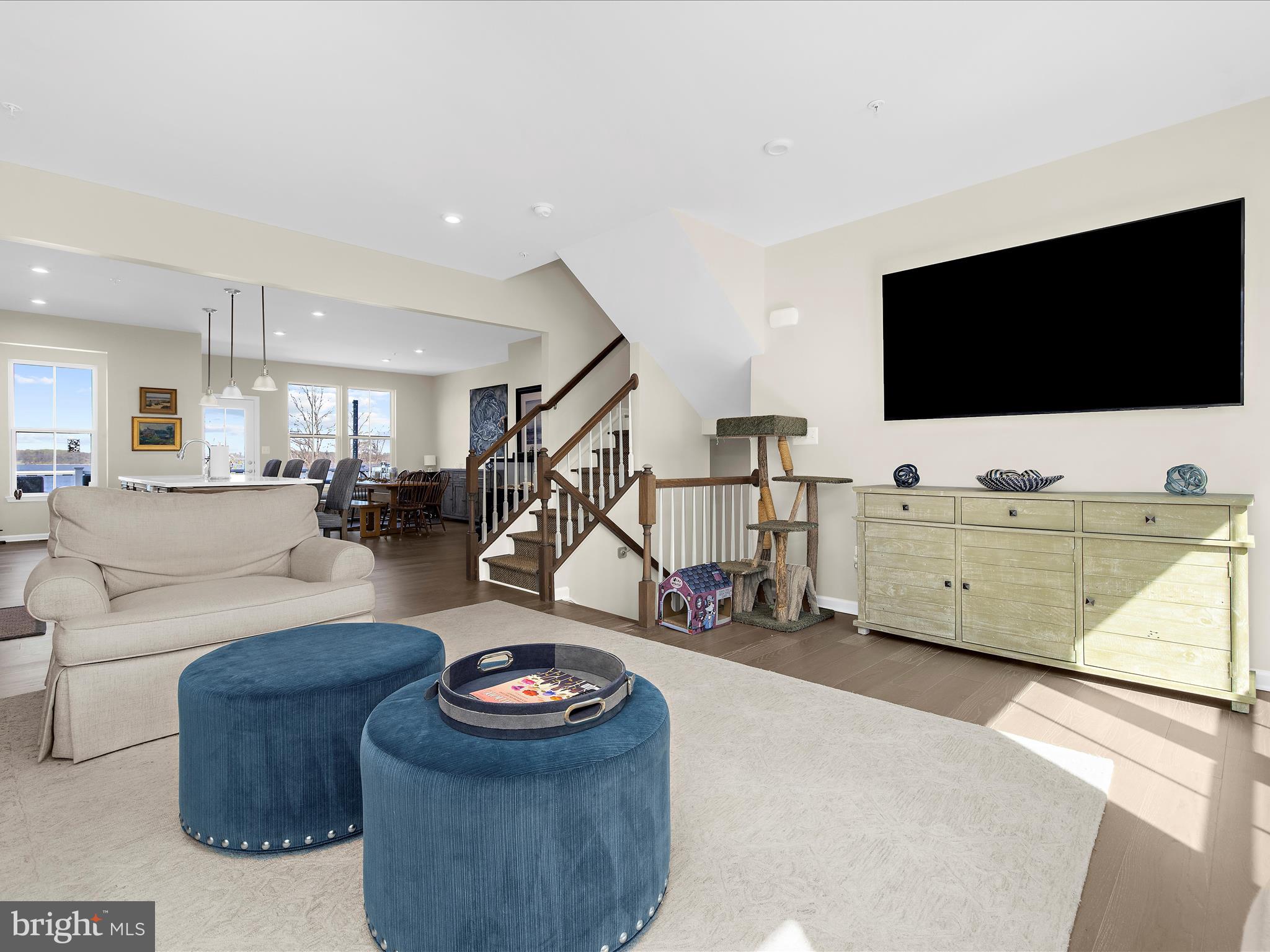 3100 Shaws Road Edgemere, MD 21219 - Photo 7 of 88 a living room with furniture and a flat screen tv