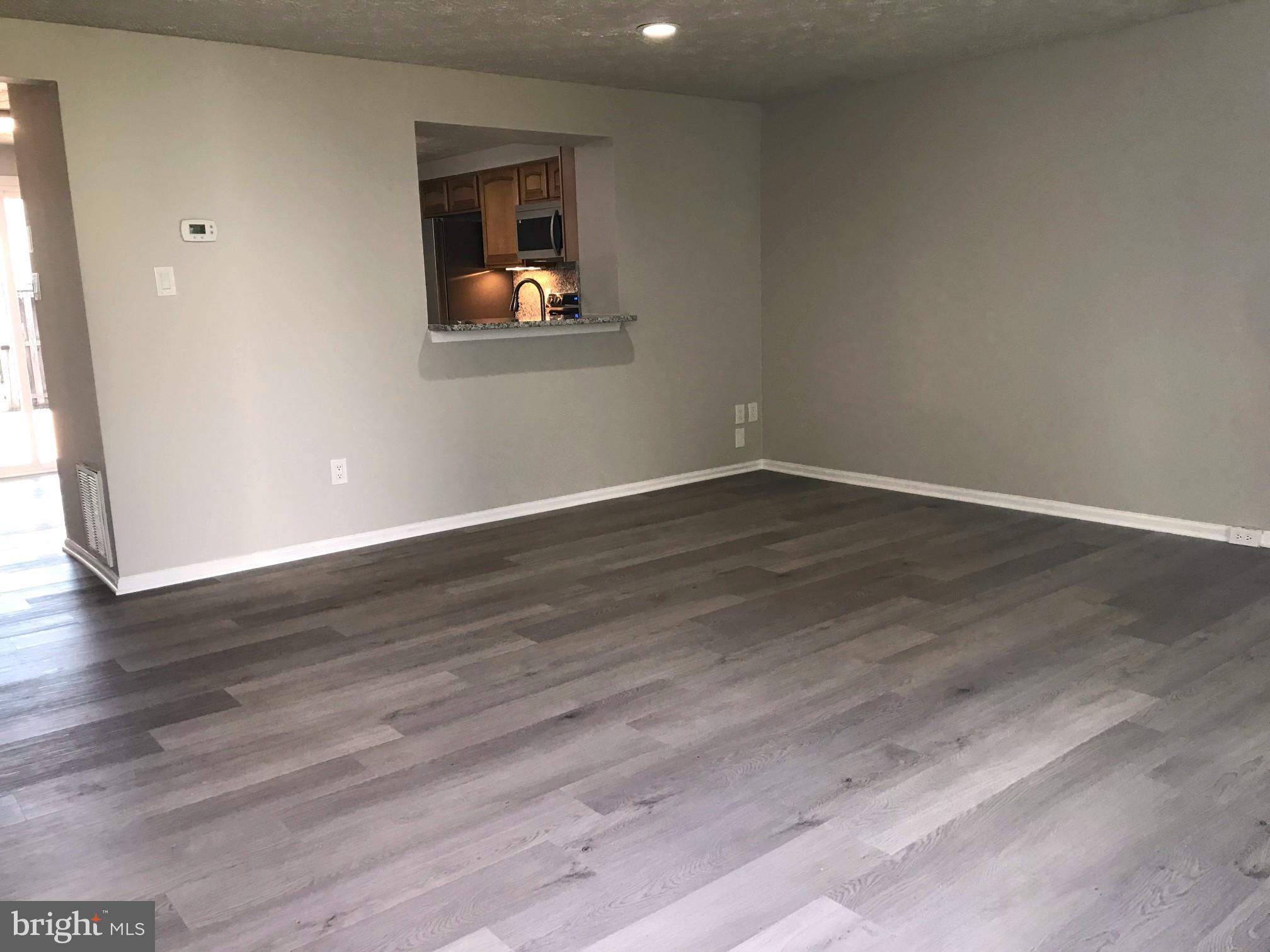 6937 Villa-Del-Rey Court Springfield, VA 22150 - Photo 9 of 23 NEW LVP FLOORING