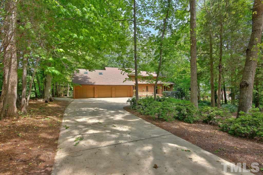 10008 Old Warden Road Raleigh, NC 27615 - Photo 1 of 24 a view of a backyard