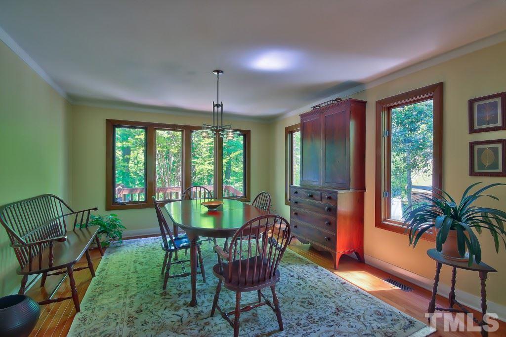 10008 Old Warden Road Raleigh, NC 27615 - Photo 6 of 24 a view of a dining room with furniture window and outside view