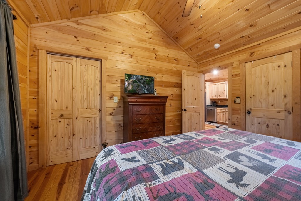 205 Mountain View Road Cherry Log, GA 30522 - Photo 15 of 28 a bedroom with a bed and a dresser