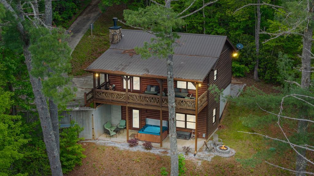 205 Mountain View Road Cherry Log, GA 30522 - Photo 27 of 28 an aerial view of a house with a garden