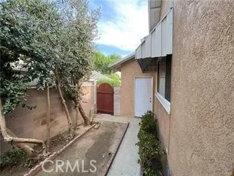 a house view with a backyard space