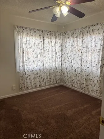 en empty room with a empty space and a window