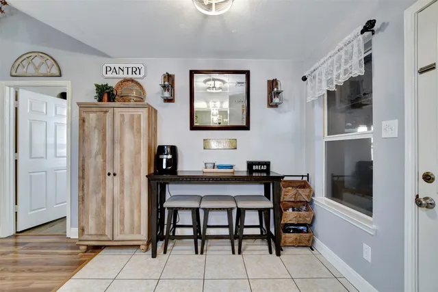 a workspace with furniture and window