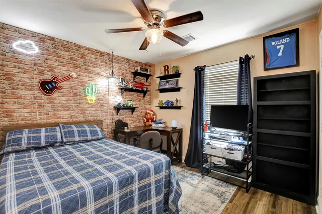 a bedroom with a bed and a walk in closet